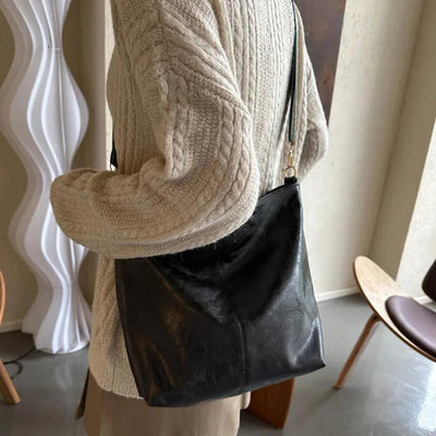 Sac à bandoulière en cuir avec charme vintage de Chelsey